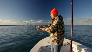 Angler fishing with the best saltwater fishing rod